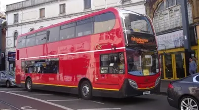A red double decker rail replacement bus on a road