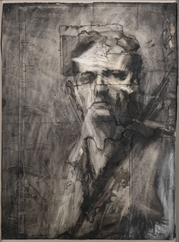 A charcoal portrait drawing of a white man with dark hair