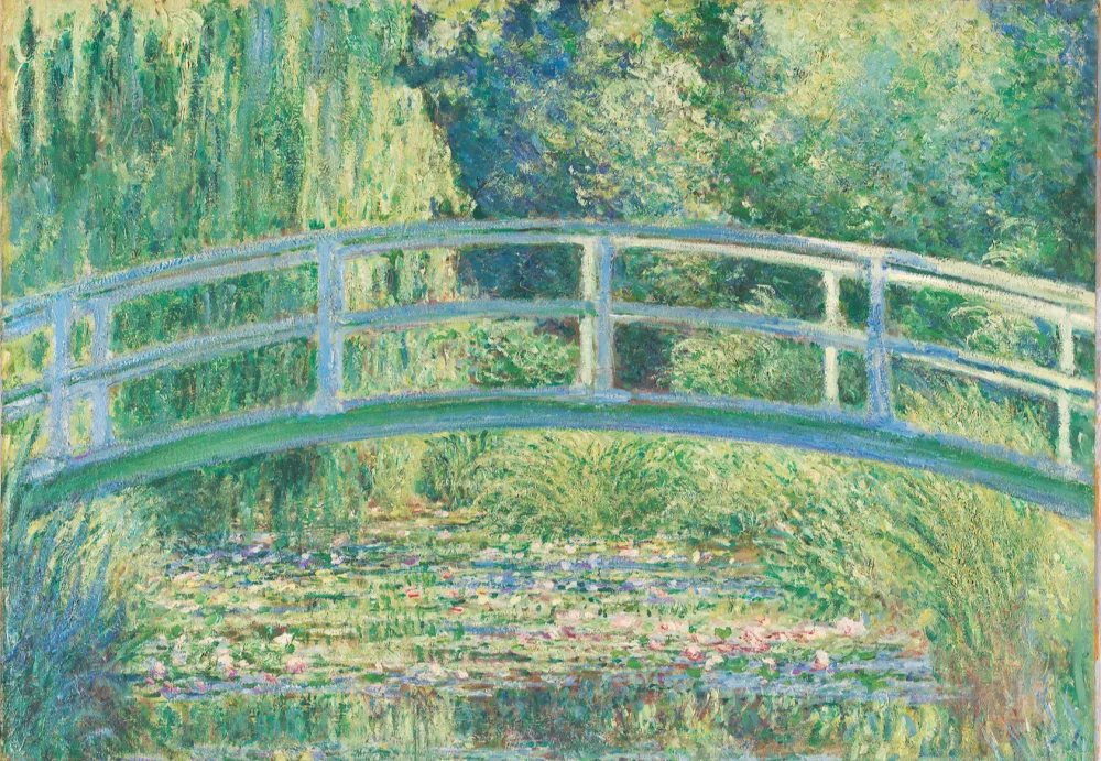A famous painting by Monet of a bridge over a pond covered with water lillies