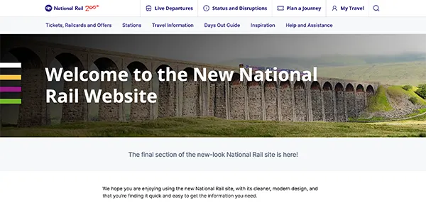Image of the homepage of the National Rail website with a headline that says 'Welcome to the New National Rail Website' over a photograph of a train going over a viaduct in the countryside. 