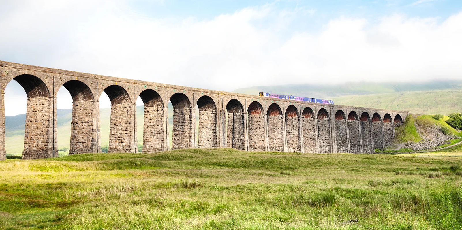 A train crossing the Ribblehead viaduct in Yorkshire