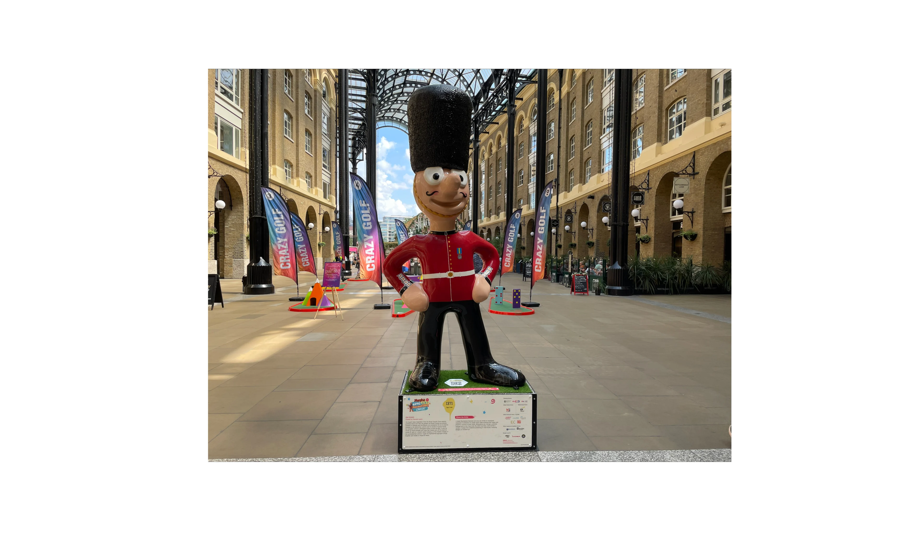 A 6 foot high statue of Morph dressed as a Royal Guard, located in Hay's Galleria in London